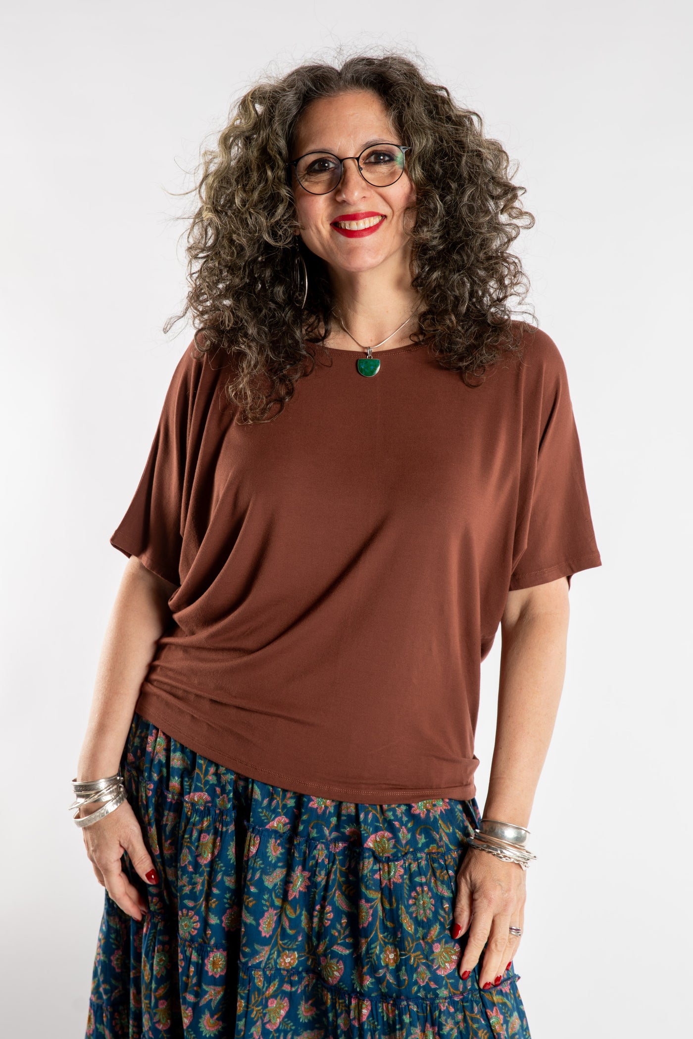 Susan is wearing the Allie Dolman in Brown in L/XL