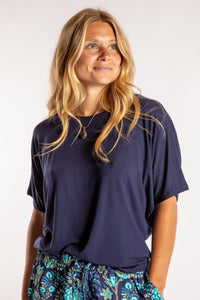 Sophie is wearing size S/M top in Blue Harbor