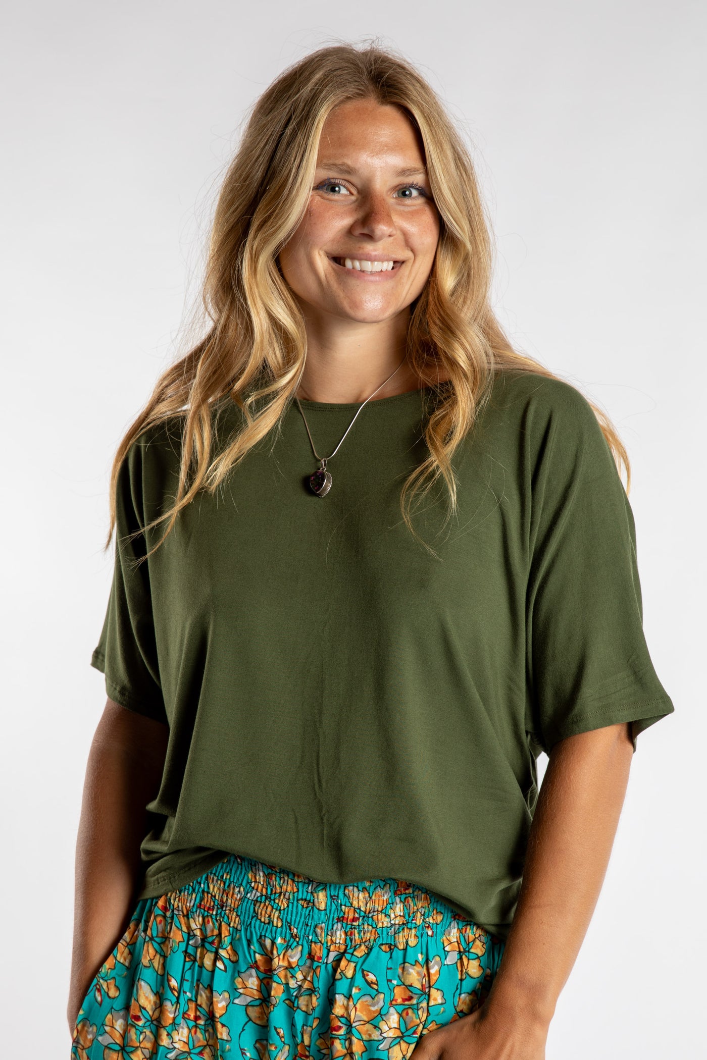 Sophie is wearing size S/M top in Green Meadow