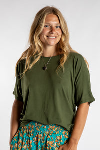 Sophie is wearing size S/M top in Green Meadow