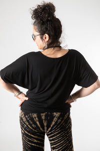 Susan wearing the Allie Dolman Sleeve Top size L/XL in black