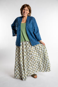 Betty is wearing the one size Anandi cardigan in Blue