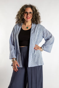 Susan is wearing the one size Anandi cardigan in Periwinkle