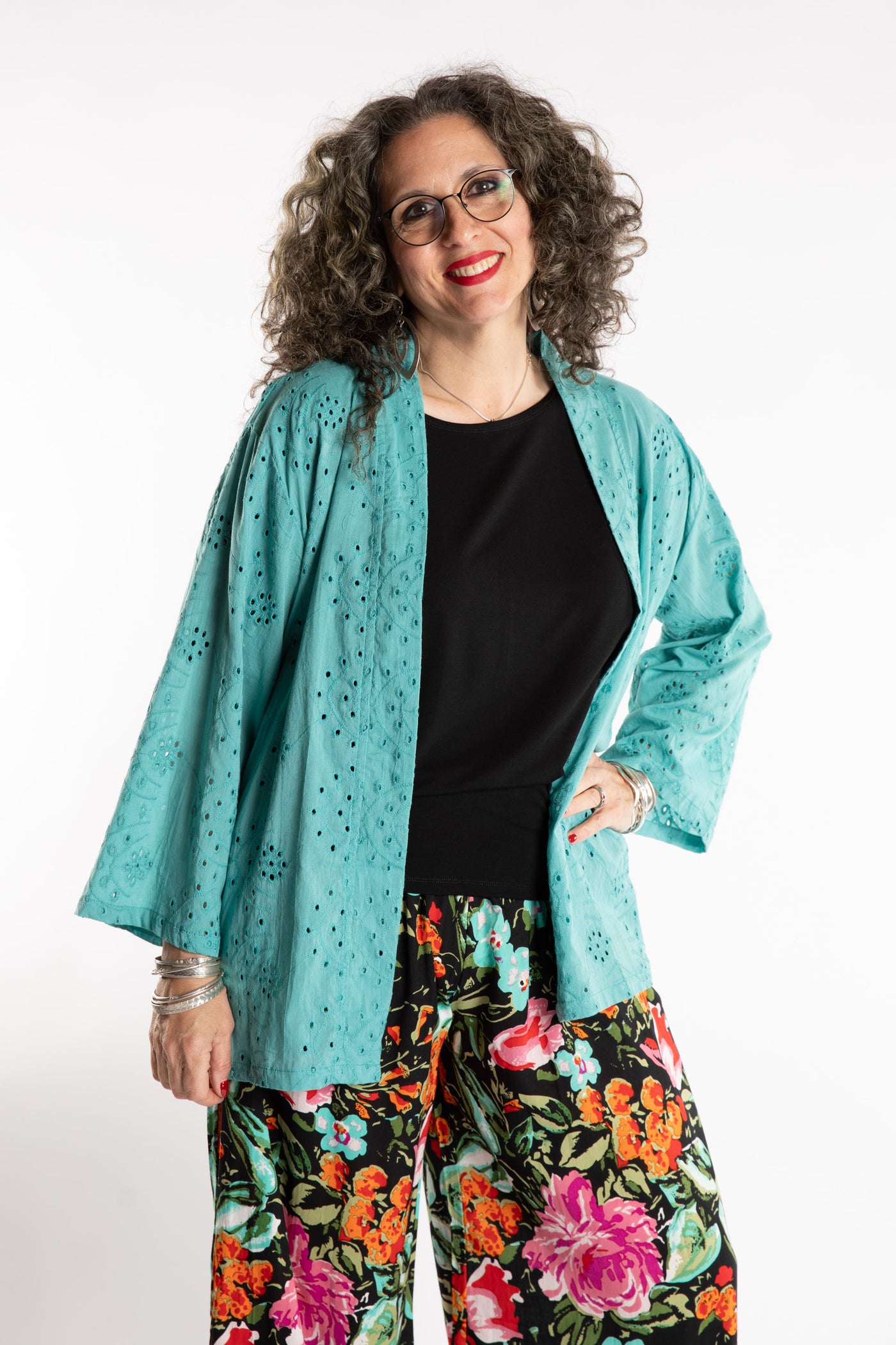 Susan is wearing the one size Anandi cardigan in Seafoam