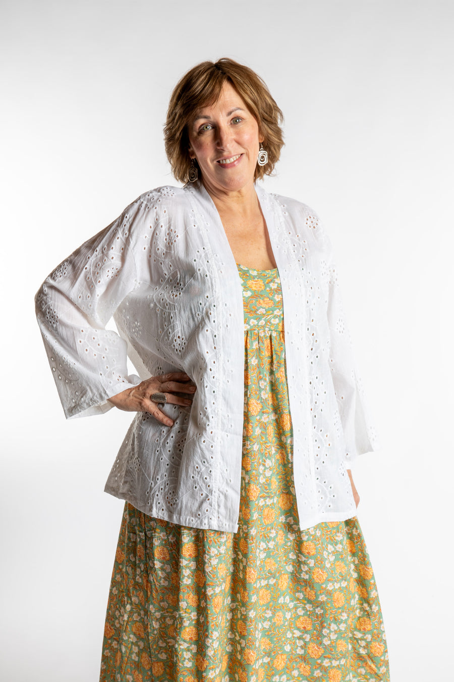 Betty is wearing the one size Anandi cardigan in White