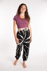 Emily is wearing the Black Anika Tie Dye Jogger Pants in S/M