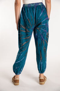 Emily is wearing the Blue Anika Tie Dye Jogger Pants in S/M