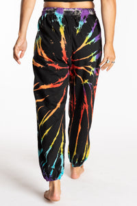 Sophie is wearing the Rainbow Anika Tie Dye Jogger Pants in S/M