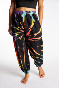 Sophie is wearing the Rainbow Anika Tie Dye Jogger Pants in S/M