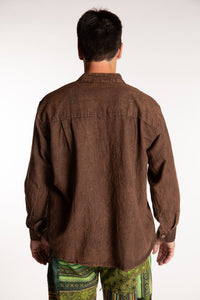 Topher is wearing the Brown Baje Stone Wash Henley Shirt in a Large