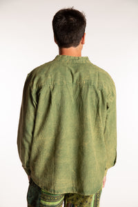 Topher is wearing the Green Baje Stone Wash Henley Shirt in a Large