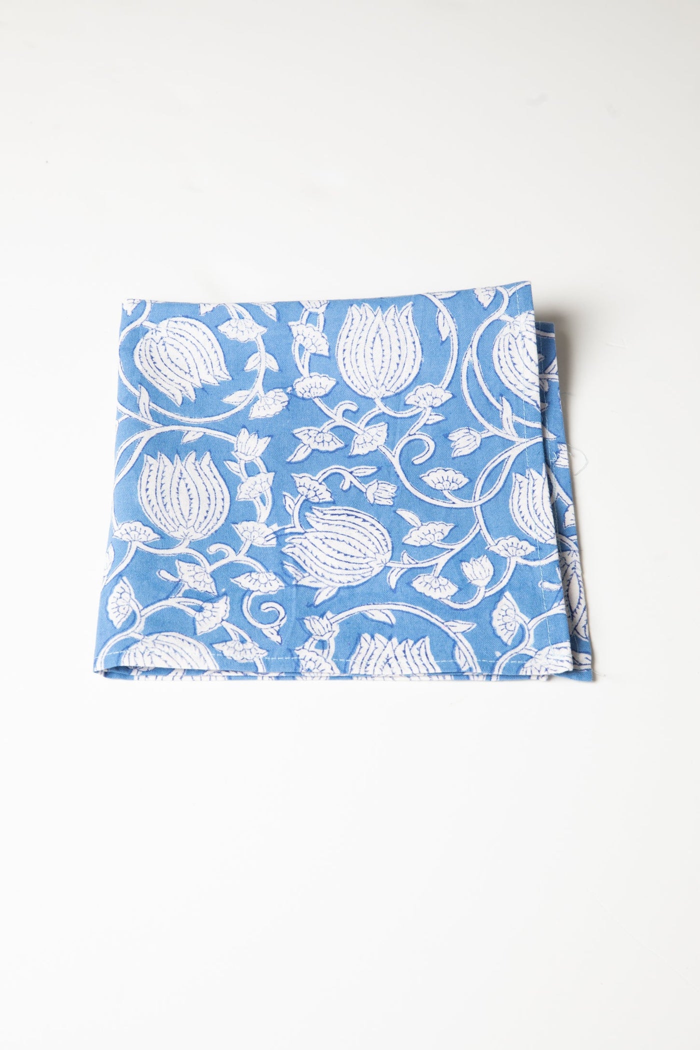Block print napkin in blue poppies