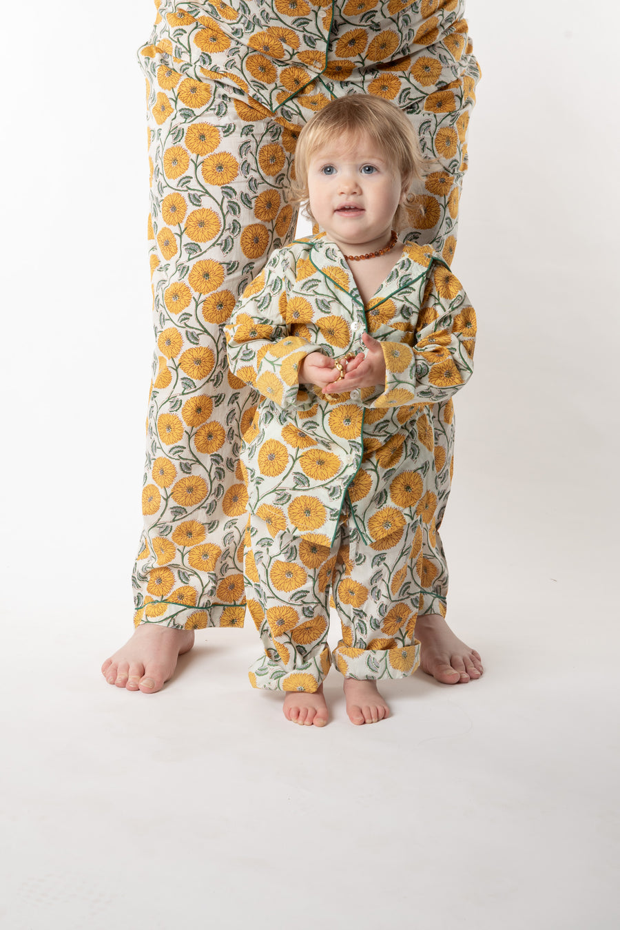Daisy is wearing size 2/3 pajama set in dandelion