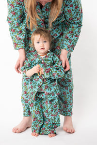 Daisy is wearing size 2/3 pajama set in turquoise rosa