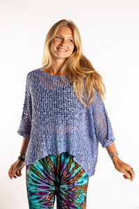 Sophie is wearing the Butterfly Lightweight Poncho in Blue