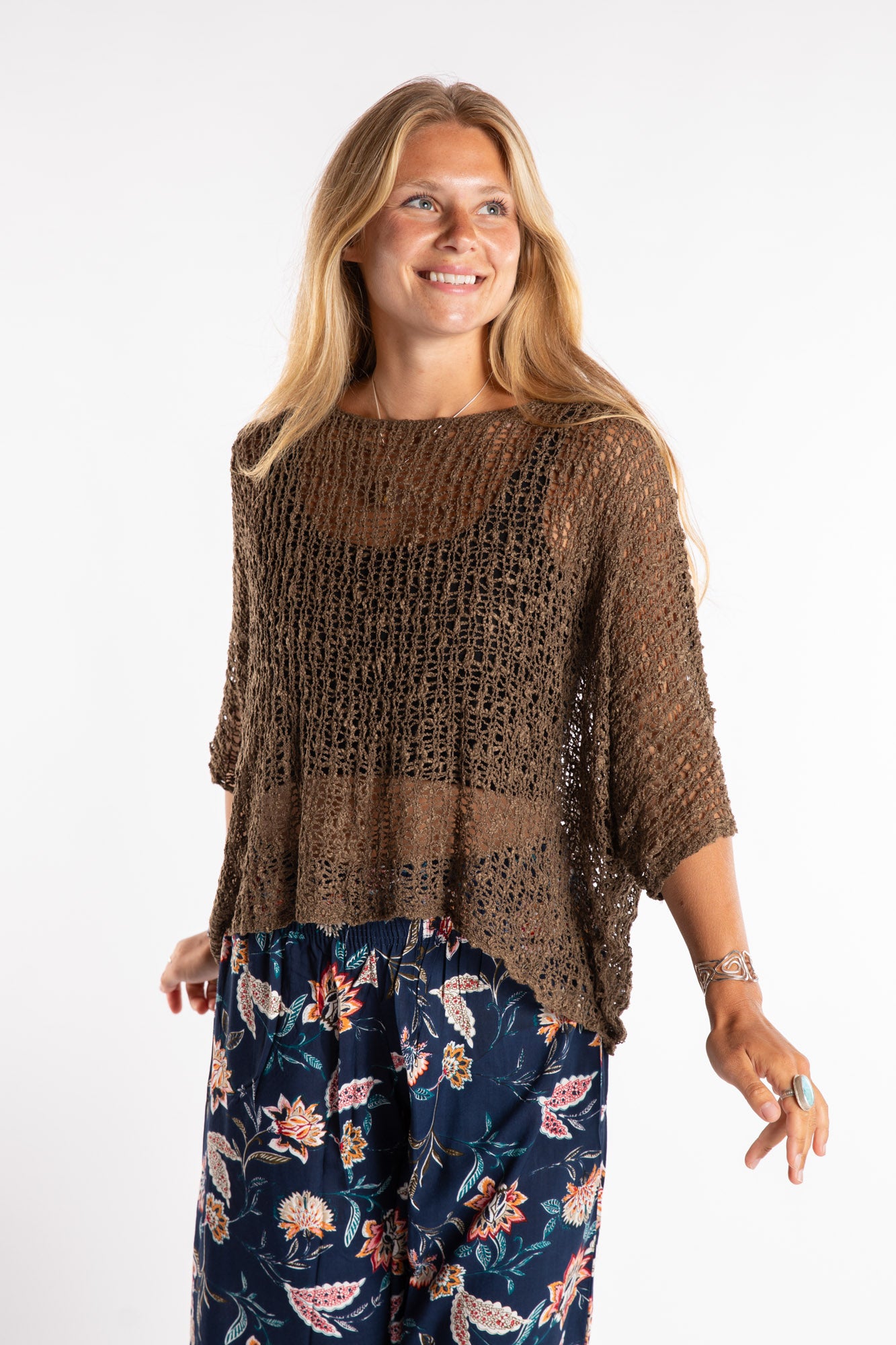 Sophie is wearing the Butterfly Lightweight Poncho in Brown
