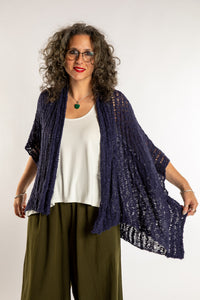 Susan is wear the Cascade Loose Weave Cardigan in Navy