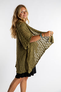 Sophie is wear the Cascade Loose Weave Cardigan in Olive