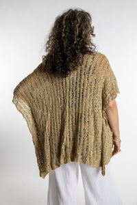 Susan is wear the Cascade Loose Weave Cardigan in Tan