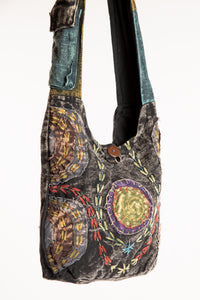 The Cosmic Spiral Sling Bag in Black