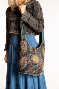 The Cosmic Spiral Sling Bag in Black
