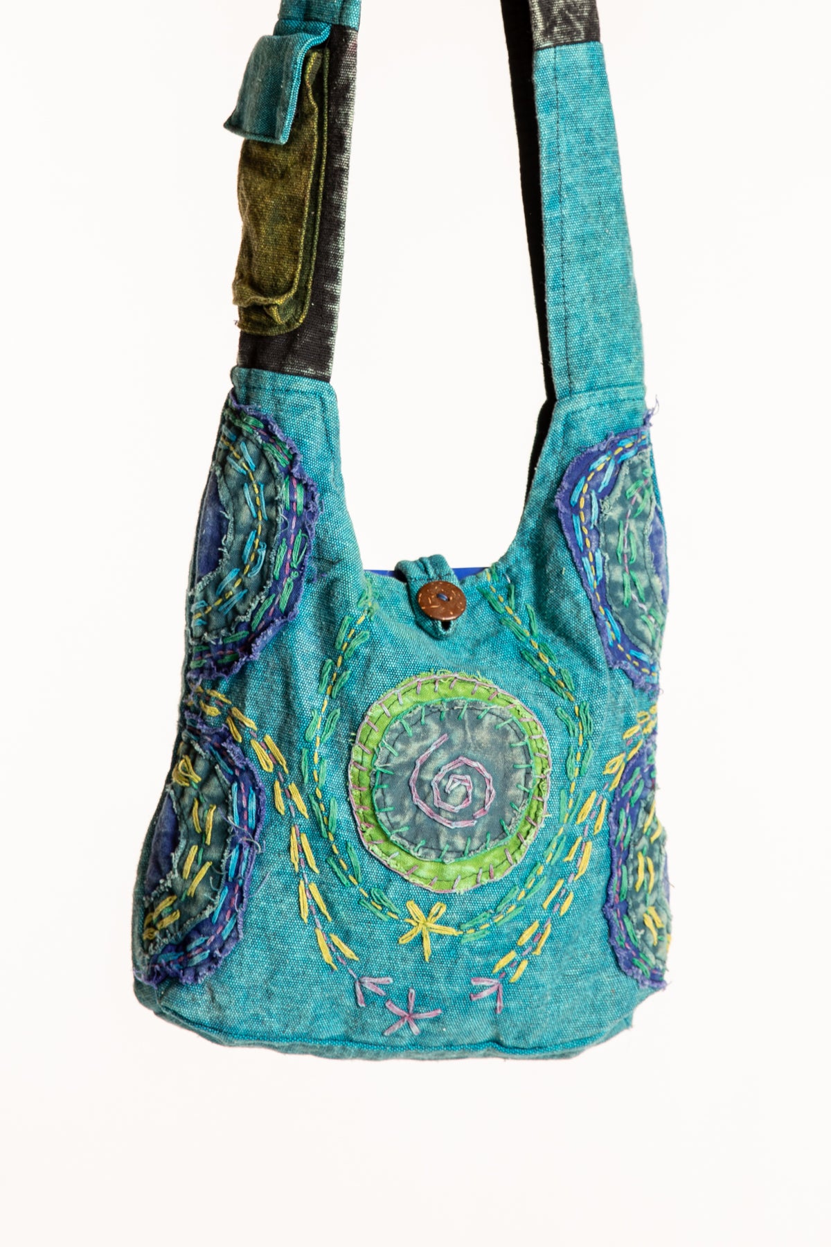 The Cosmic Spiral Sling Bag in Blue