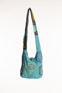 The Cosmic Spiral Sling Bag in Blue