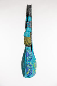 The Cosmic Spiral Sling Bag in Blue