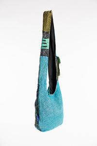 The Cosmic Spiral Sling Bag in Blue
