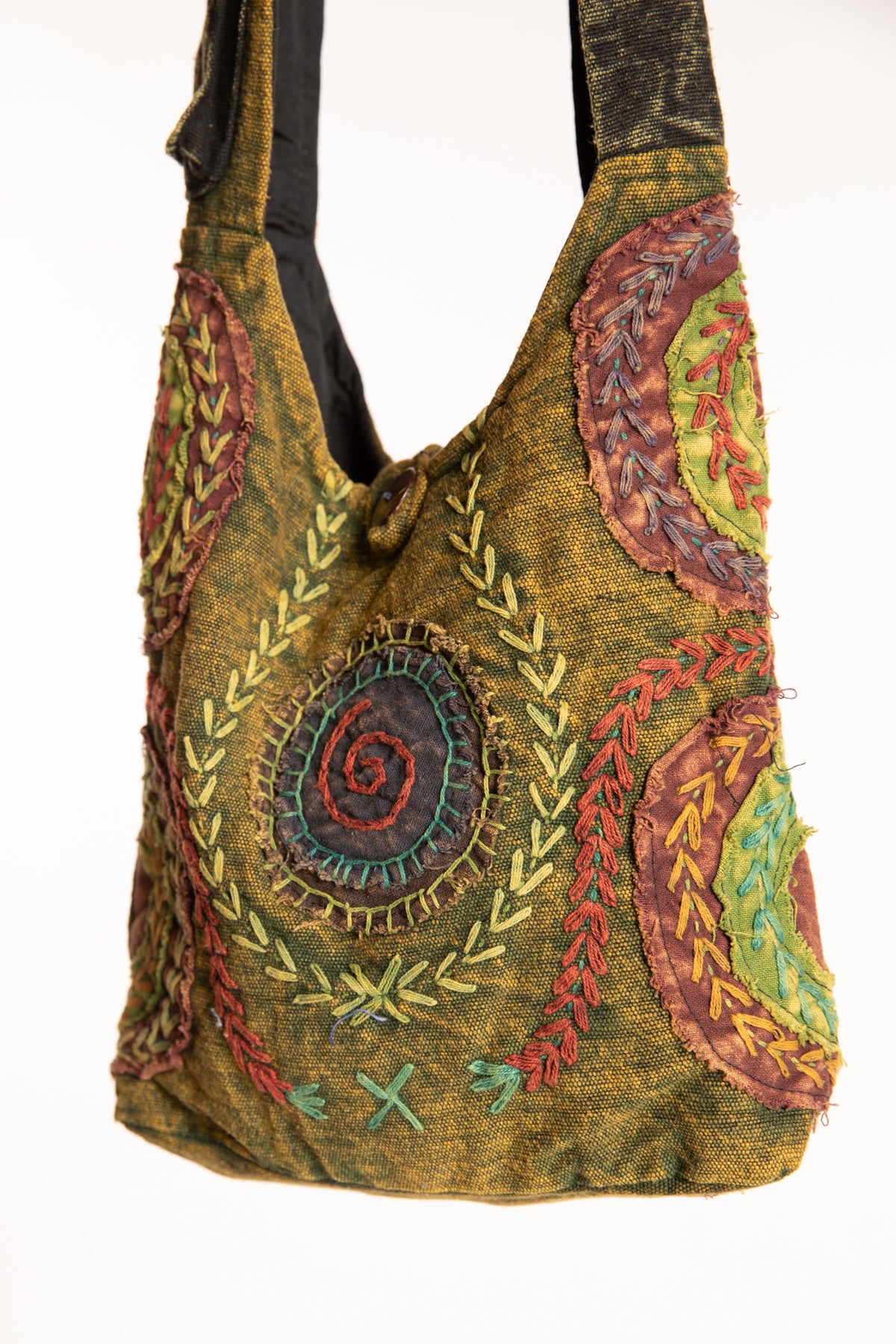 The Cosmic Spiral Sling Bag in Green