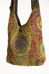 The Cosmic Spiral Sling Bag in Green