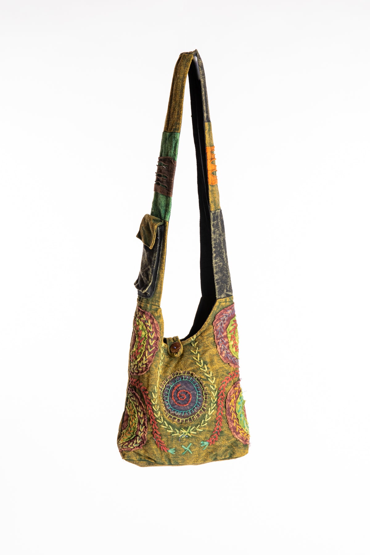 The Cosmic Spiral Sling Bag in Green
