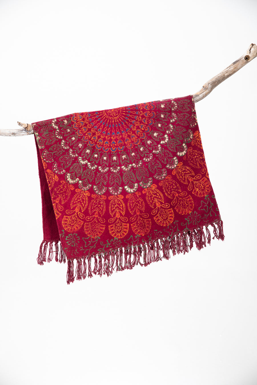 Block print woven rug in red mandala