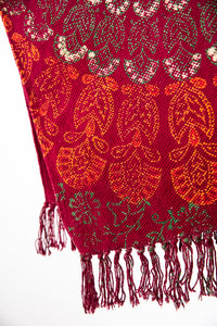 Block print woven rug in red mandala
