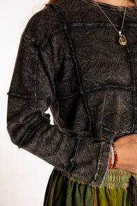 Sophie is wearing the S/M Didi Patchwork Crop Top in Black