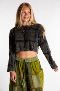 Sophie is wearing the S/M Didi Patchwork Crop Top in Black