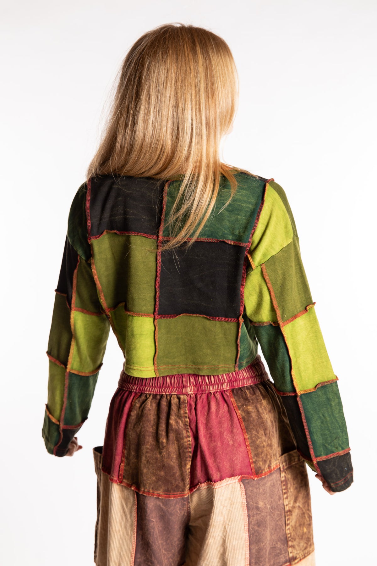 Sophie is wearing the S/M Didi Patchwork Crop Top in Green