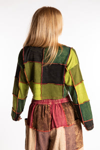 Sophie is wearing the S/M Didi Patchwork Crop Top in Green