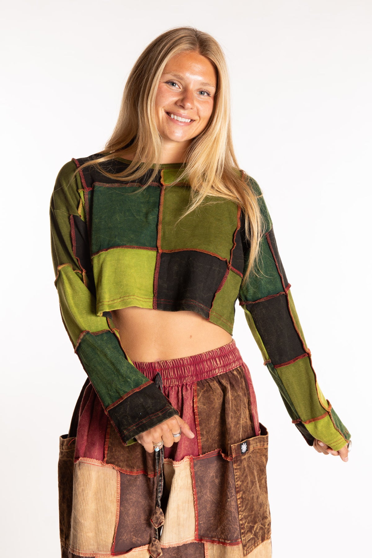 Sophie is wearing the S/M Didi Patchwork Crop Top in Green