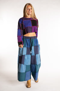 Sophie is wearing the S/M Didi Patchwork Crop Top in Purple