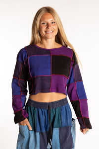 Sophie is wearing the S/M Didi Patchwork Crop Top in Purple