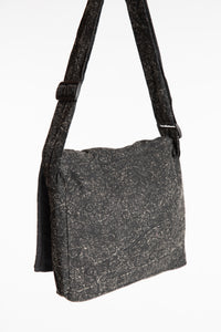 The black ebb and flow messenger bag 