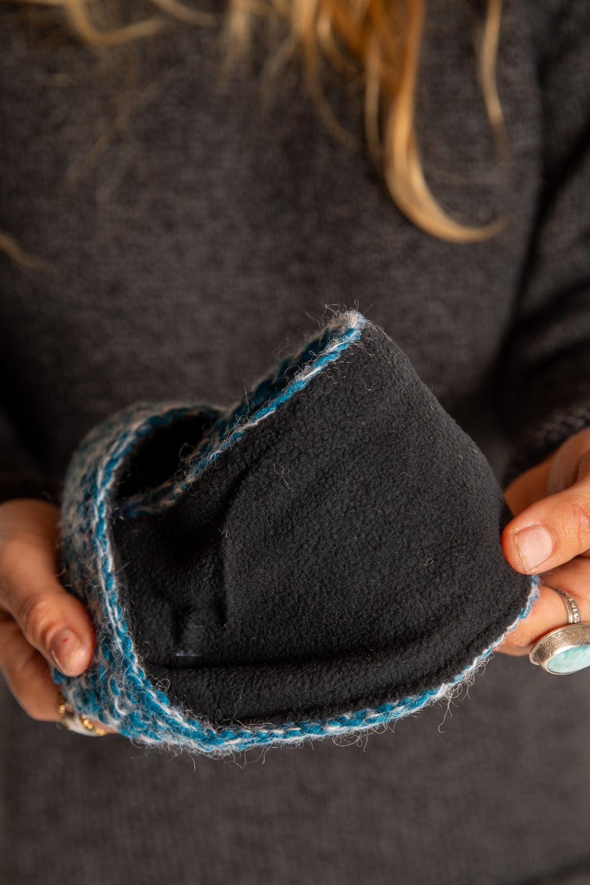 Sophie is wearing the Ember Plush Wool Headband in Aqua
