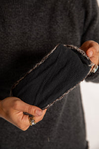 Sophie is wearing the Ember Plush Wool Headband in Brown