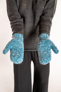 Sophie is wearing the Ember Plush Knit Wool Mittens in Aqua