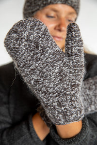 Sophie is wearing the Ember Plush Knit Wool Mittens in Brown