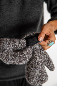 Sophie is wearing the Ember Plush Knit Wool Mittens in Brown