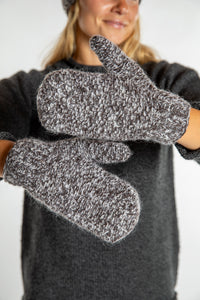 Sophie is wearing the Ember Plush Knit Wool Mittens in Brown