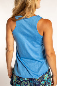 Sophie is wearing size S/M tank top in Blue Maine