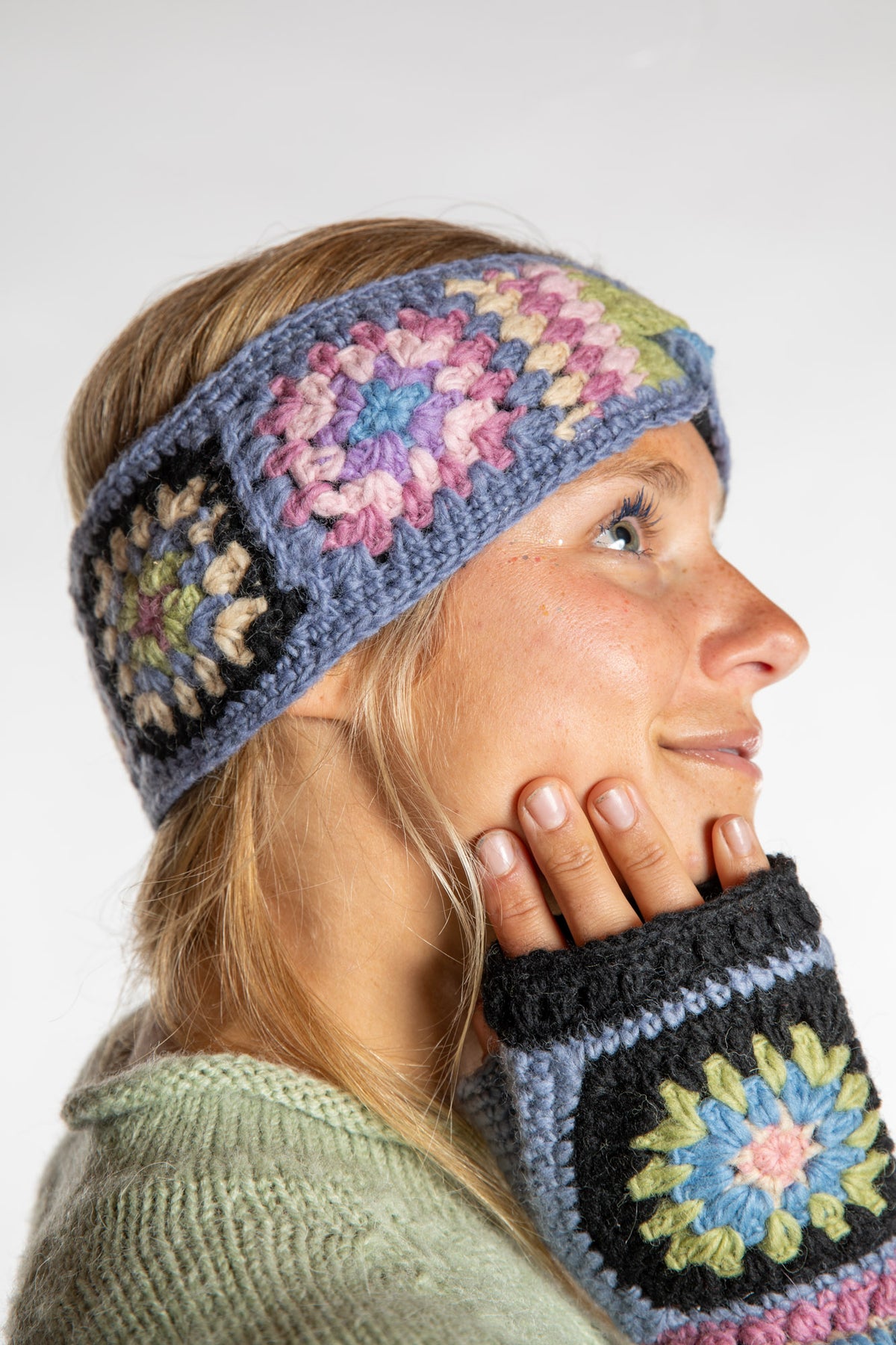 Sophie is wearing the Granny Square Wool Headband in Lavender